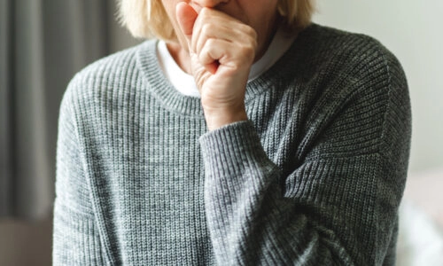 Woman coughing